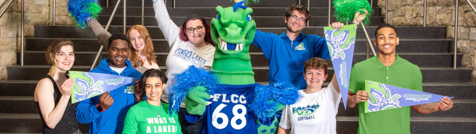 Students and the FLCC mascot Flick show off their school spirit with Laker pennants and pompoms.