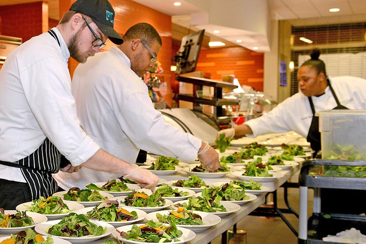 Julia Cookbook available now! Culinary students and faculty member prepping salads