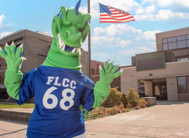 Flick, FLCC's mascot outside the main building on the Canandaigua, NY campus